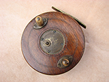 Early 20th century Slaters latch 4" centrepin starback reel.